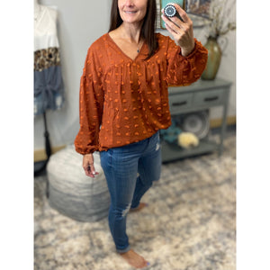 “Harvest Festival” Swiss Dot Long Bubble Sleeve V-Neck Floaty Top Rust