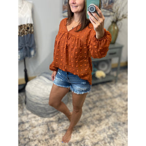 “Harvest Festival” Swiss Dot Long Bubble Sleeve V-Neck Floaty Top Rust