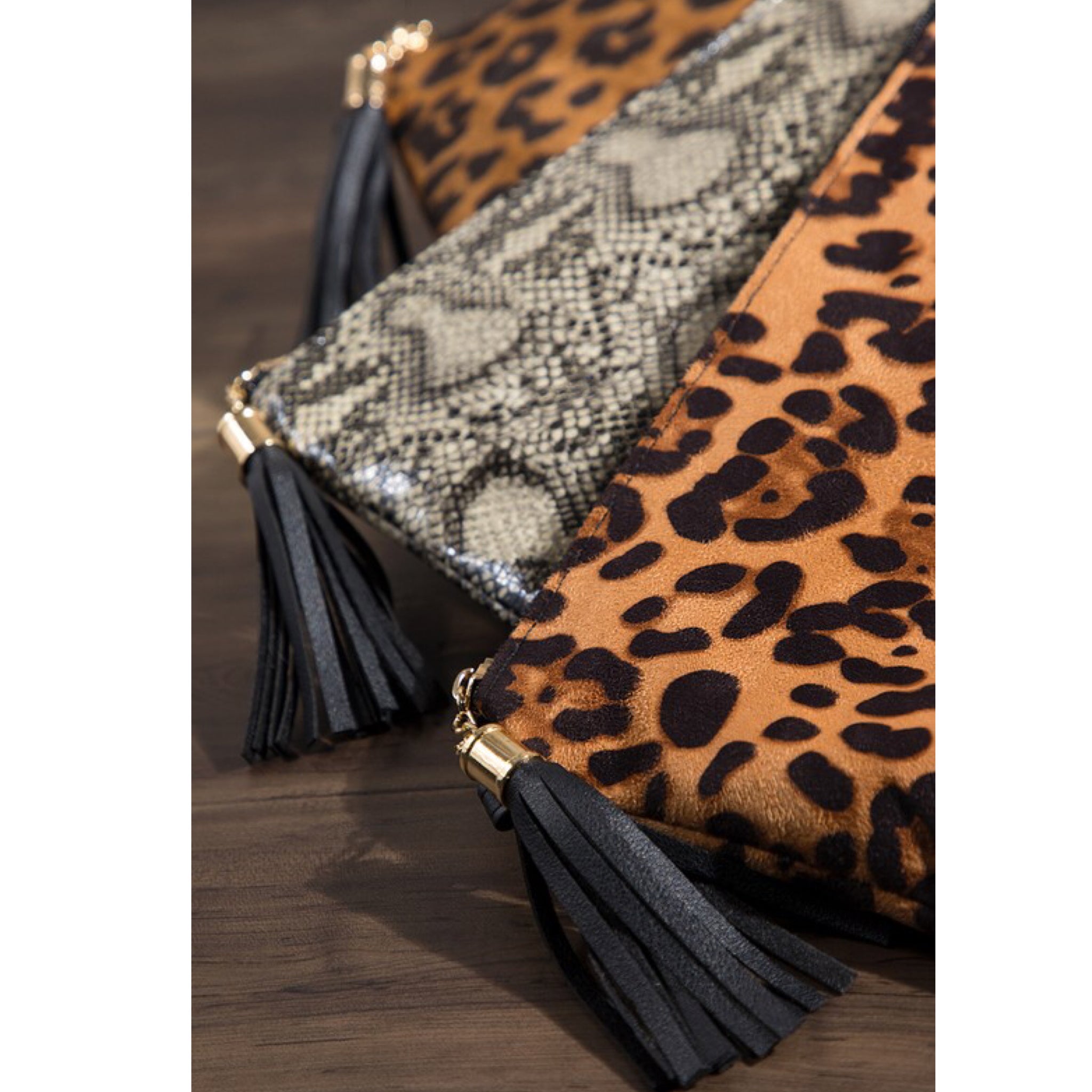 Snake Print Tassel Cross Body Clutch Wristlet Adjustable Strap Black Cream